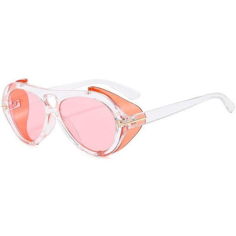 Elevate your summer look with these funky, pink goggle-shaped sunglasses.