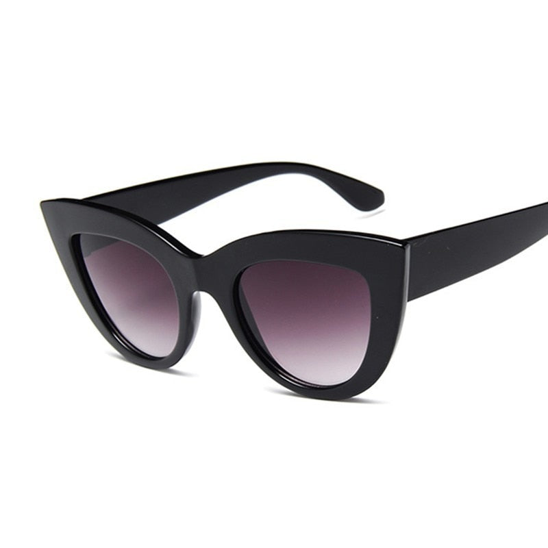 A pair of classic vintage cat-eye sunglasses in black 