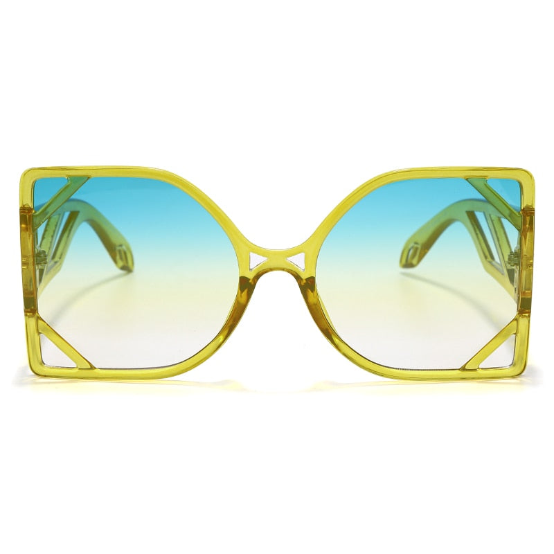 Tropical Vibe sunglasses with a futuristic, retro vibe and round-shaped lens.
