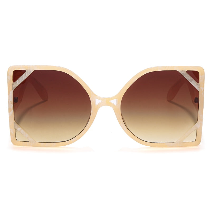 Elevate your summer look with pink oversized vintage round shield sunglasses.