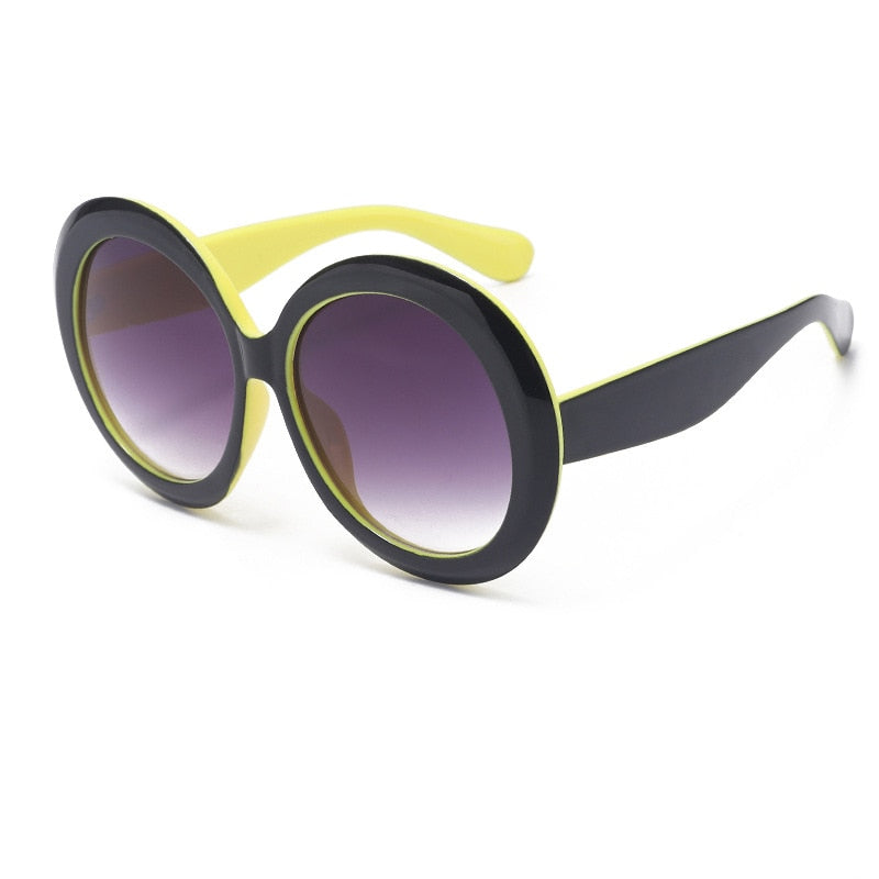 black and yellow round sunglasses