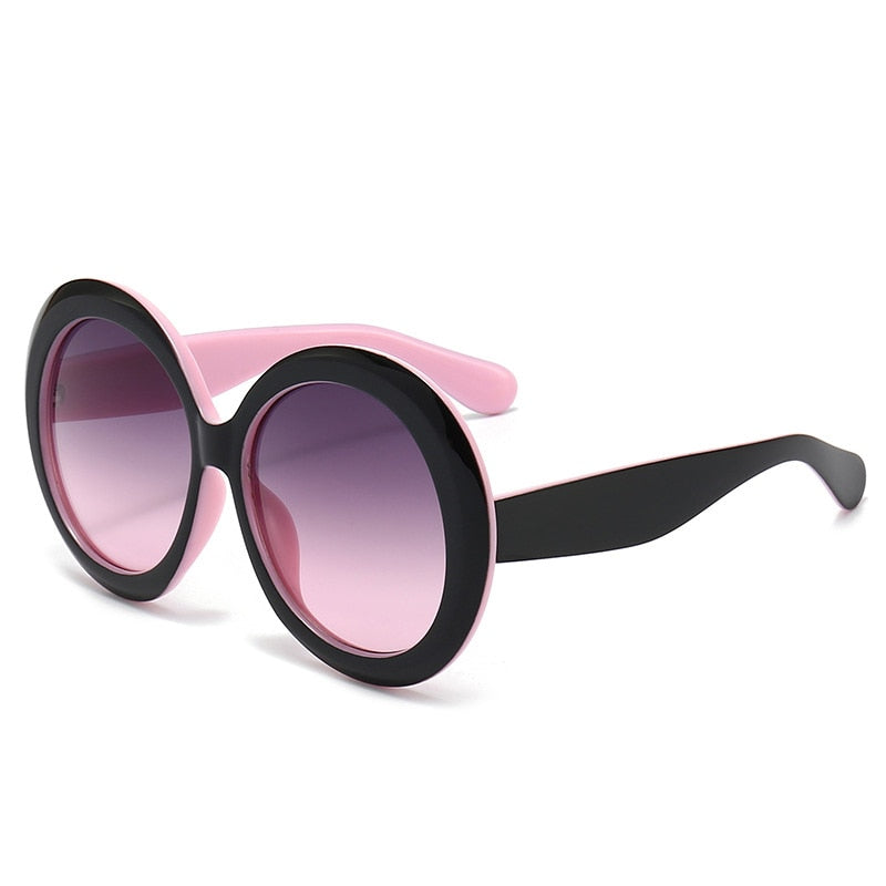 black and pink round sunglasses