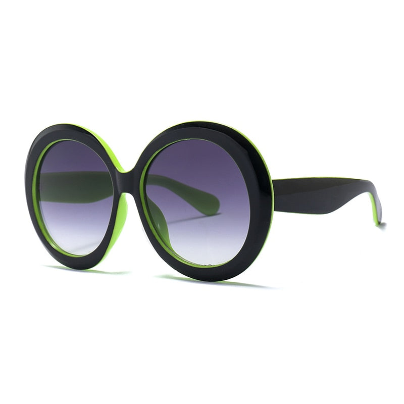 green and black round sunglasses